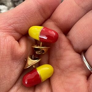 Red and Yellow Capsule Pins
